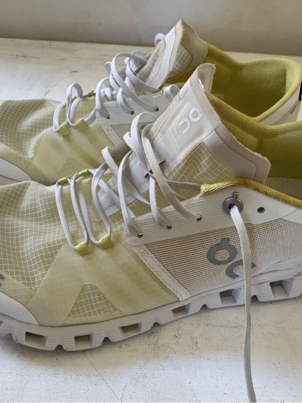 On Running Sneakers in White and Pale Yellow